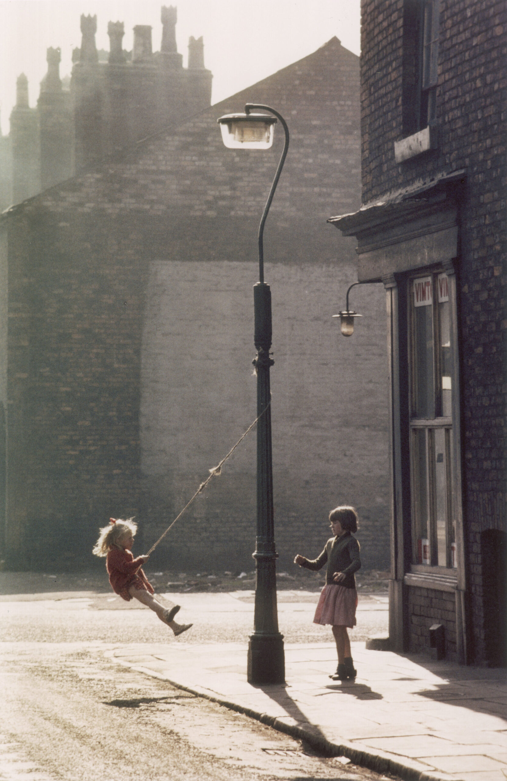 Girl Swinging from a Lamppost, Hulme