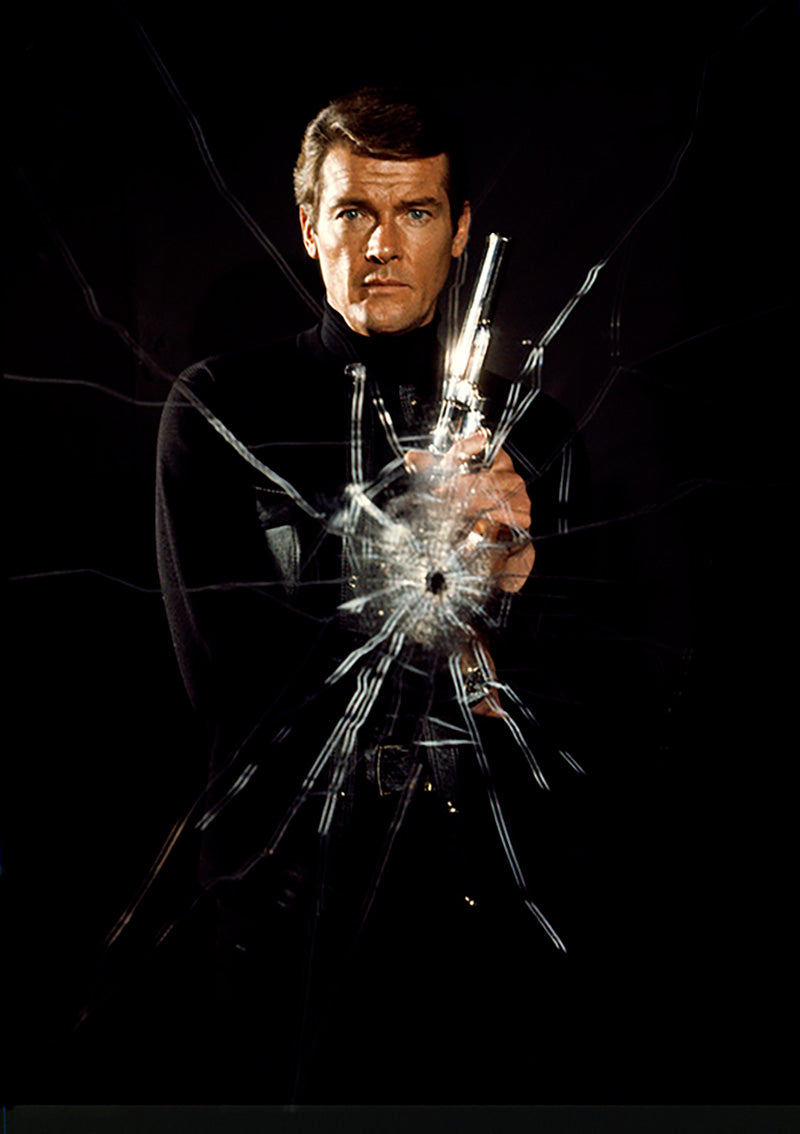 Roger Moore as James Bond poses as superspy on the film set of 'Live and let die', 1973