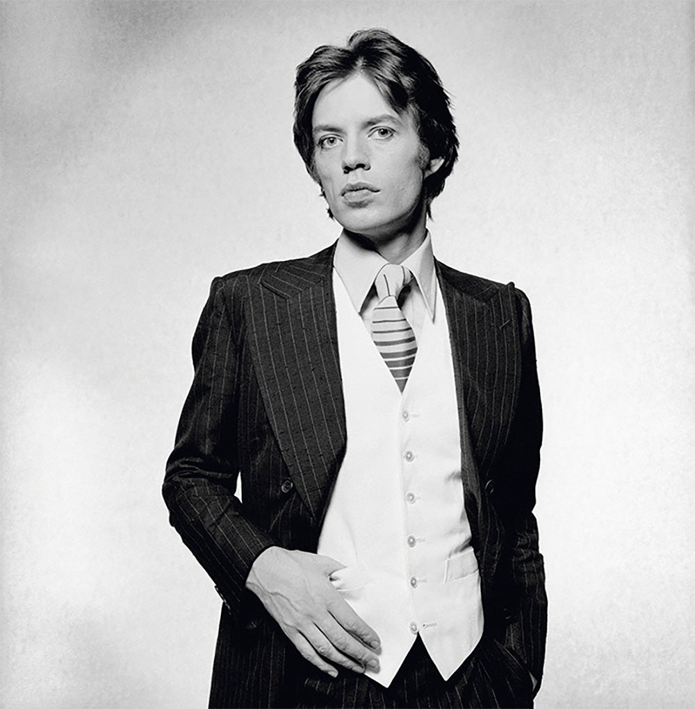 Rolling Stones singer Mick Jagger dressed in a pinstripe suit, 1976