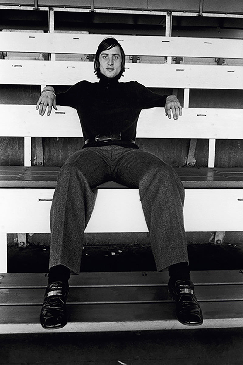 Johan Cruyff sitting in the stands, mid 1970s