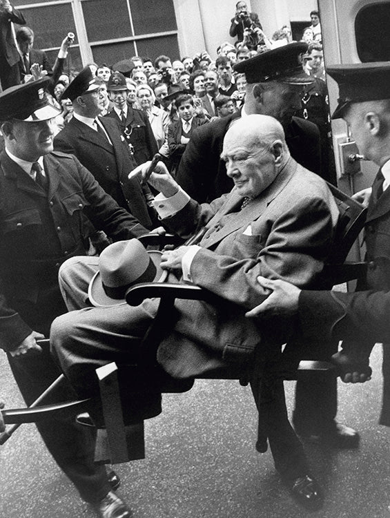 Winston Churchill carried from an ambulance, 1962