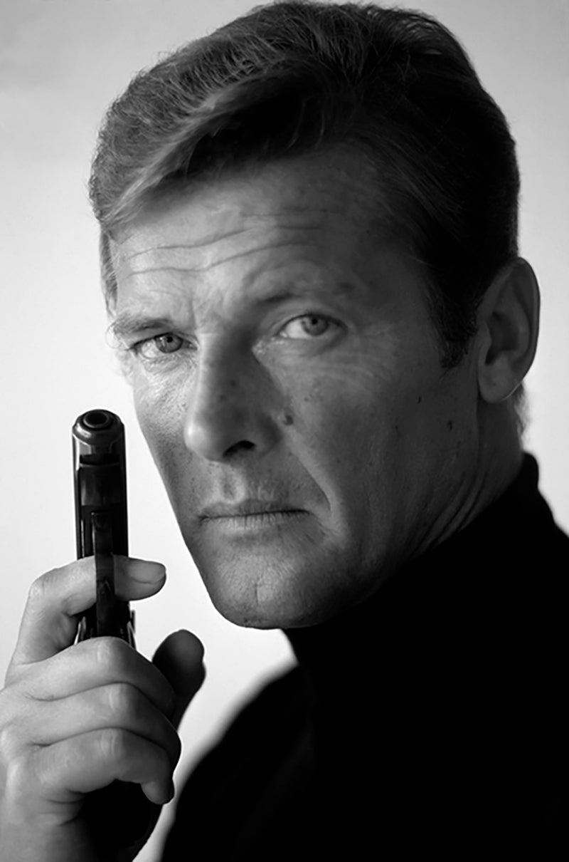 Roger Moore as James Bond, with his weapon of choice, December 1972
