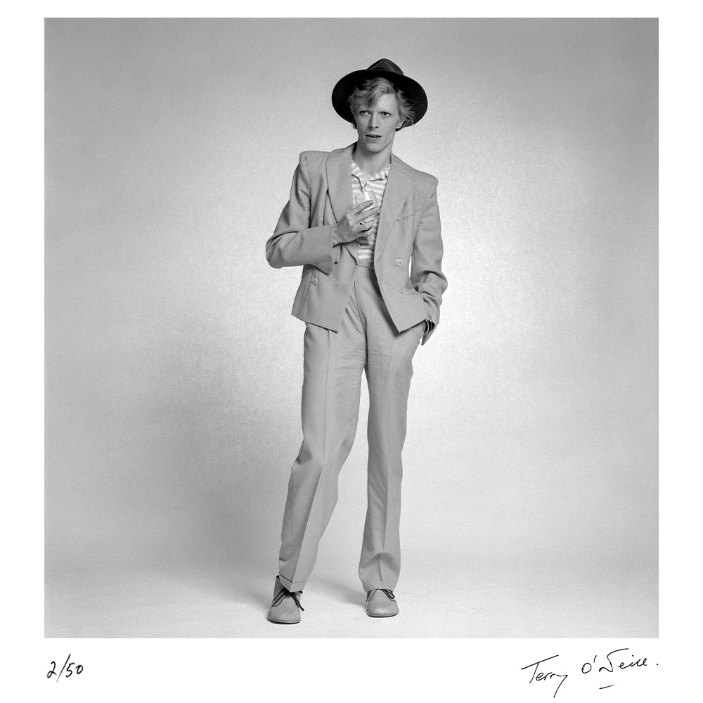 David Bowie holding a glass, 1974